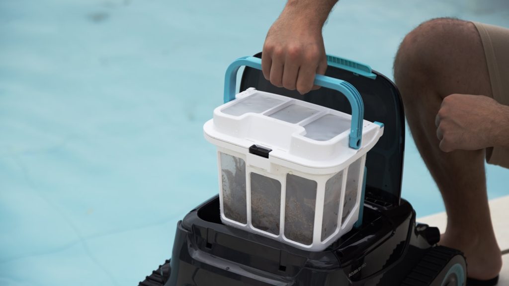 Someone is removing a pool filter.